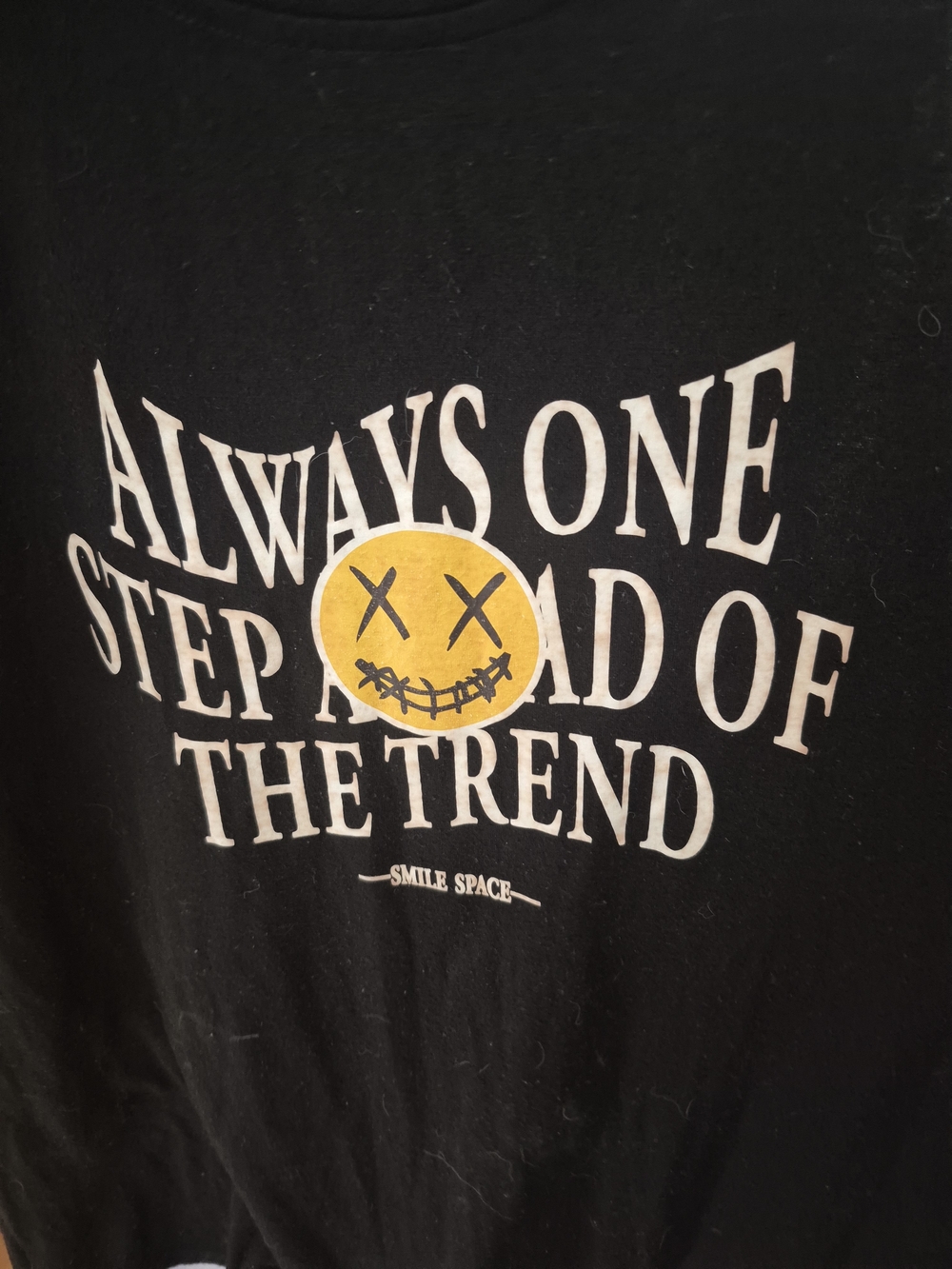 ROMWE Black Tee with White Text and Yellow Smiley Graphic